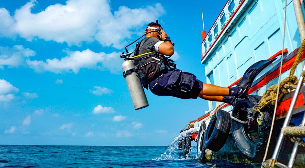 A group of scuba divers in training